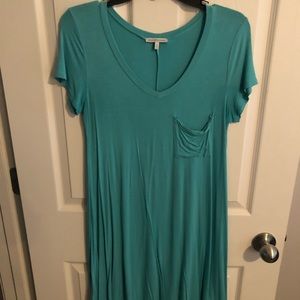 Teal t-shirt dress. Not super short.